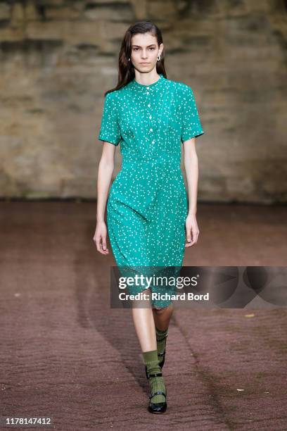 Model walks the runway during the A.P.C Womenswear Spring/Summer 2020 show as part of Paris Fashion Week on September 30, 2019 in Paris, France.