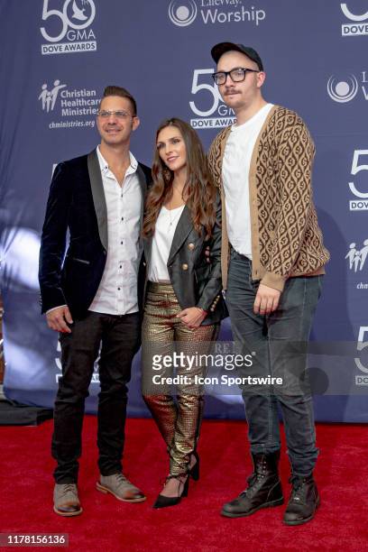 Kyle Lollis, Ashley Lollis, and Joseph Jacobson on the red carpet for the 50th Annual GMA Dove Awards at Allen Arena, Lipscomb University on October...