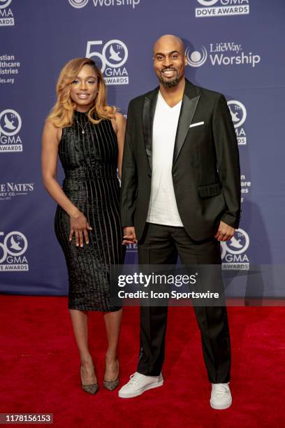 Phil Thompson and Takiyah Romain on the red carpet for the 50th Annual GMA Dove Awards at Allen Arena, Lipscomb University on October 15, 2019 in...