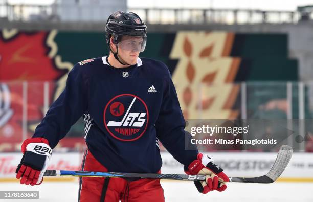 Andrew Copp of the Winnipeg Jets practices in advance of the 2019 Tim Hortons NHL Heritage Classic to be played against the Calgary Flames at Mosaic...