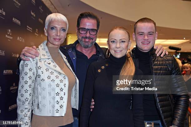 Alex Jolig, his wife Britt Jolig-Heinz and Jenny Elvers with her son Paul Elvers during the VIP Late Night Shopping Party at Alstertal shopping mall...