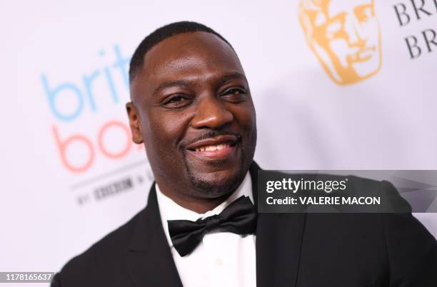 English actor Adewale Akinnuoye-Agbaje arrives for the 2019 British Academy Britannia awards at the Beverly Hilton hotel in Beverly Hills on October...