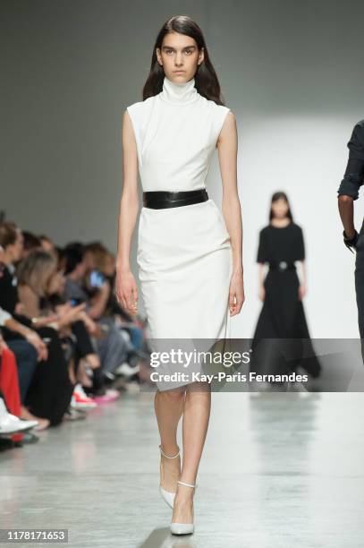 Model walks the runway during the Kristina Fidelskaya Womenswear Spring/Summer 2020 show as part of Paris Fashion Week on September 30, 2019 in...