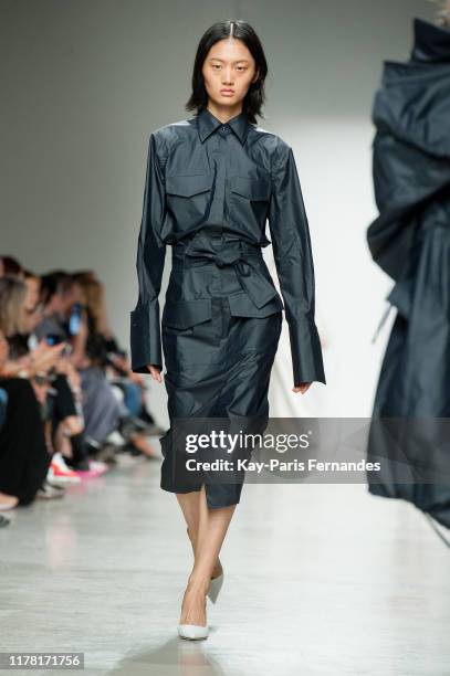 Model walks the runway during the Kristina Fidelskaya Womenswear Spring/Summer 2020 show as part of Paris Fashion Week on September 30, 2019 in...