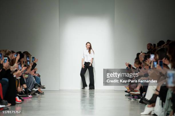 Designer Kristina Fidelskaya walks the runway during the Kristina Fidelskaya Womenswear Spring/Summer 2020 show as part of Paris Fashion Week on...