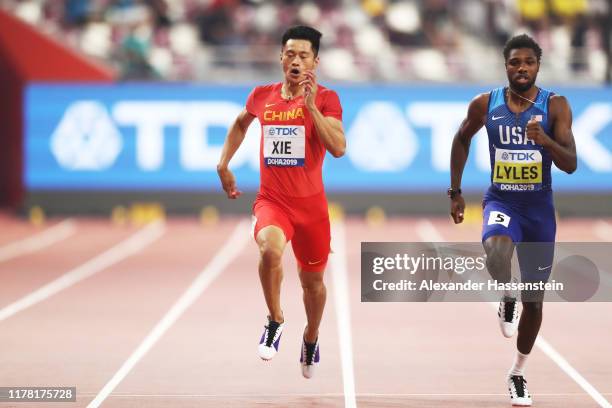 Zhenye Xie of China and Noah Lyles of the United States compete in the Men's 200 metres semi finals during day four of 17th IAAF World Athletics...