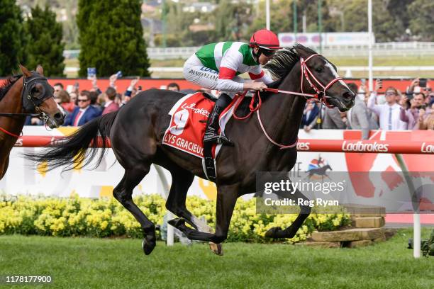 Lys Gracieux ridden by Damian Lane wins the Ladbrokes Cox Plate ,at Moonee Valley Racecourse on October 26, 2019 in Moonee Ponds, Australia.