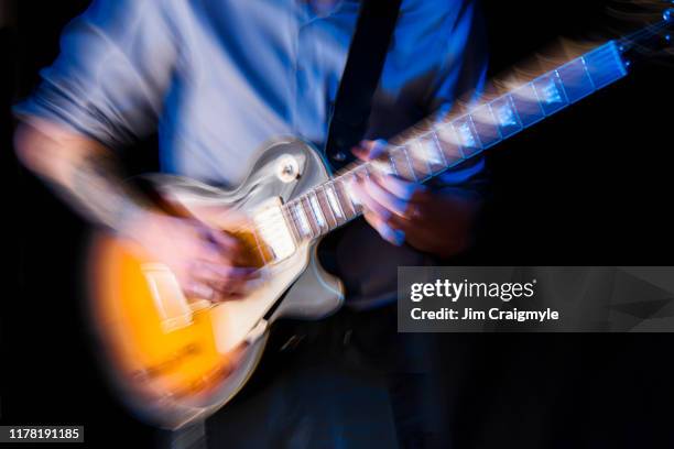 guitarist blurred motion - jim craigmyle guitar stock pictures, royalty-free photos & images