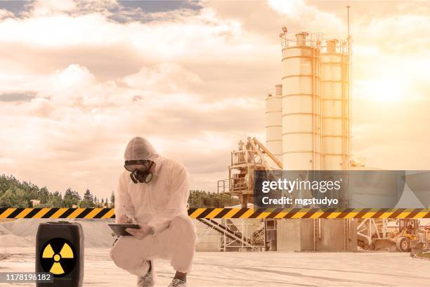 danger zone - radiation suit stock pictures, royalty-free photos & images
