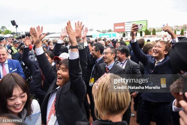 Connections of Lys Gracieux celebrate after winning the Ladbrokes Cox Plate at Moonee Valley Racecourse on October 26, 2019 in Moonee Ponds,...