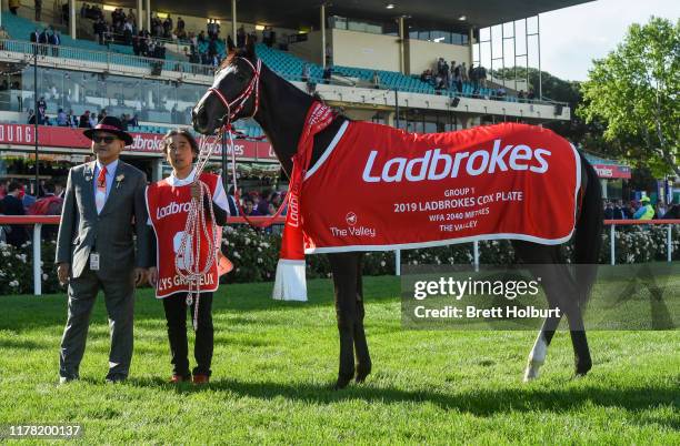 Lys Gracieux and trainer Yoshito Yahagi after winning the Ladbrokes Cox Plate ,at Moonee Valley Racecourse on October 26, 2019 in Moonee Ponds,...