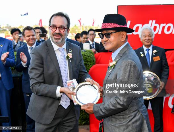 Presentations to trainer of Lys Gracieux , Yoshito Yahagi after winning the Ladbrokes Cox Plate ,at Moonee Valley Racecourse on October 26, 2019 in...