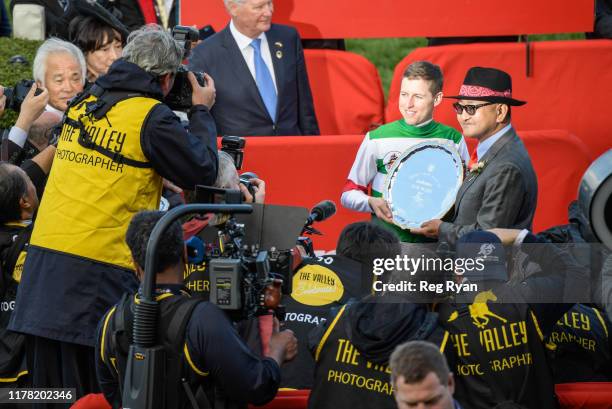 Damian Lane with trainer of Lys Gracieux , Yoshito Yahagi after winning the Ladbrokes Cox Plate at Moonee Valley Racecourse on October 26, 2019 in...