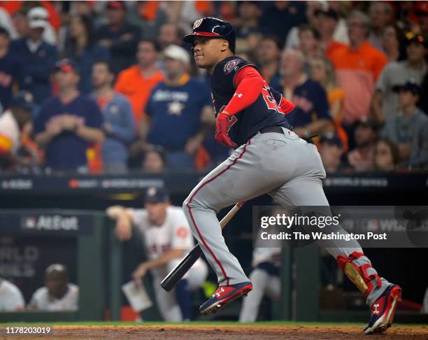 Washington Nationals left fielder Juan Soto hits a 2 run RBI double during the Washington Nationals defeat of the Houston Astros 5-4 in game 1 of the...