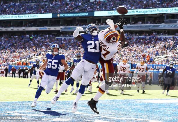 Jabrill Peppers of the New York Giants breaks up a touchdown catch against Jeremy Sprinkle of the Washington Redskins during their game at MetLife...