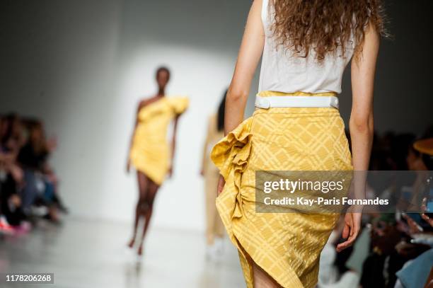 Model walks the runway during the Kristina Fidelskaya Womenswear Spring/Summer 2020 show as part of Paris Fashion Week on September 30, 2019 in...