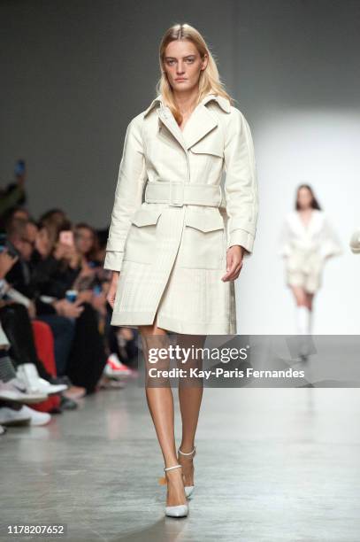 Model walks the runway during the Kristina Fidelskaya Womenswear Spring/Summer 2020 show as part of Paris Fashion Week on September 30, 2019 in...