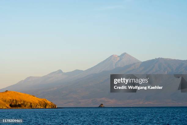 View of Gili Kenawa and Lombok Island, Indonesia with the active volcano Mount Rinjani or Gunung Rinjani.