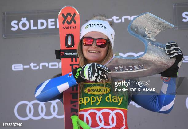 Winner New Zealand's Alice Robinson poses on the podium of the Women's giant slalom at the FIS ski World cup on October 26, 2019 in Soelden, Austria.