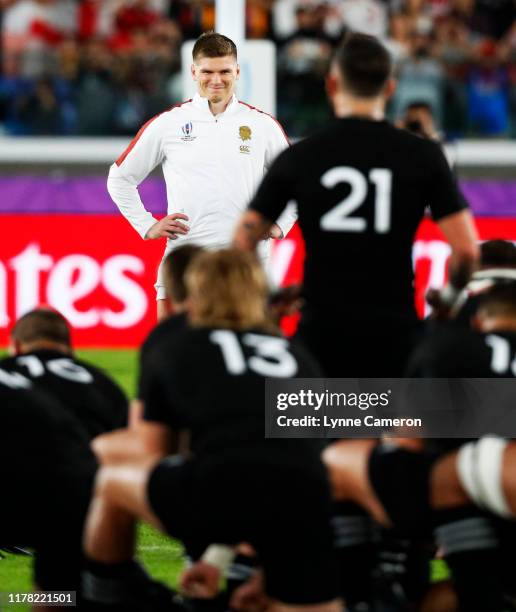 Owen Farrell of England watches the Haka during the Rugby World Cup 2019 Semi-Final match between England and New Zealand at International Stadium...