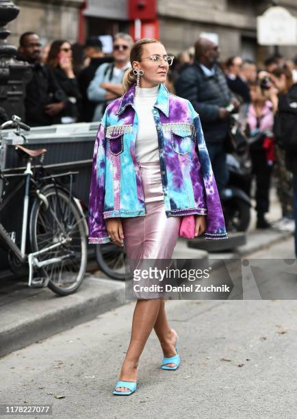 Guest is seen outside the Giambattista Valli show during Paris Fashion Week SS20 on September 30, 2019 in Paris, France.