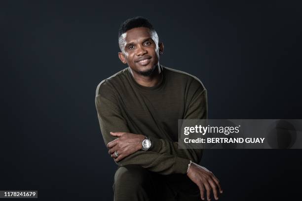 Former Cameroonian forward Samuel Eto'o poses during a photo session on October 24, 2019 in Paris.
