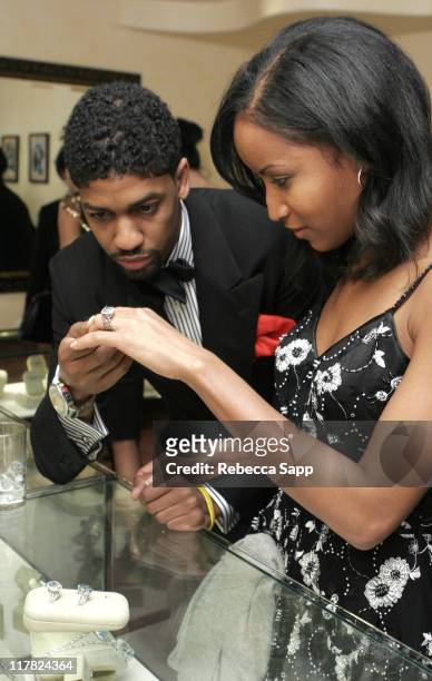 Fonzworth Bentley and Faune Chambers look at Erica Courtney jewelry