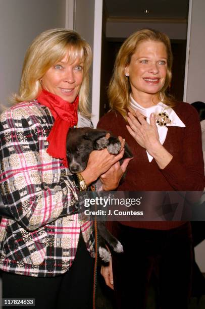 Linda Lampert and Robin Bell with "Theo". "Theo" was one of 7 pups that came from a German Shepperd that was rescued by the Humane Law Enforcement...