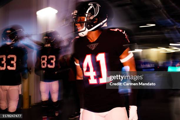 Sharrod Neasman of the Atlanta Falcons is seen in the tunnel prior to the game against the Tennessee Titans at Mercedes-Benz Stadium on September 29,...