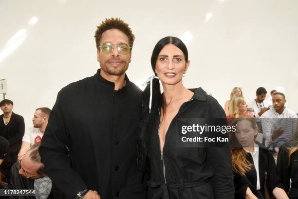 Gary Dourdan and Sylvie Ortega Munos attend the Agnes B. Womenswear Spring/Summer 2020 show as part of Paris Fashion Week on September 30, 2019 in...