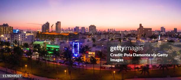 high angle view of ocean drive night scene at south beach, miami, usa. - miami nightclub stock pictures, royalty-free photos & images