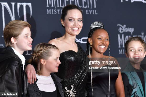 Shiloh Nouvel Jolie-Pitt, Vivienne Marcheline Jolie-Pitt, Angelina Jolie, Zahara Marley Jolie-Pitt, and Knox Léon Jolie-Pitt attend the world...