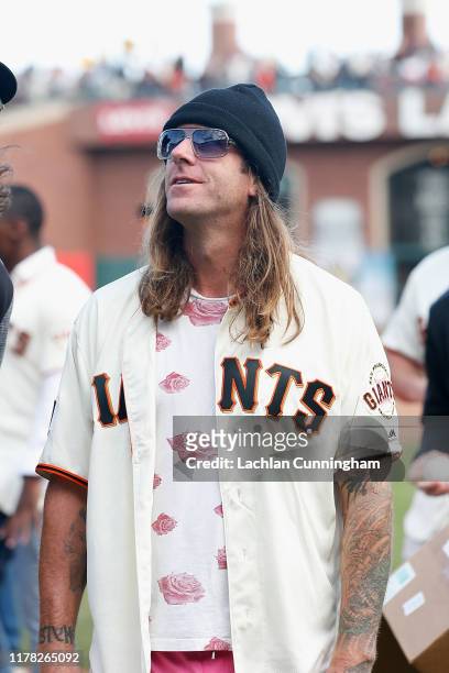 Former San Francisco Giants player Brian Wilson looks on during a ceremony celebrating the career of retiring manager Bruce Bochy of the San...
