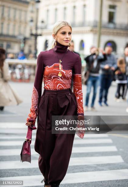 Caroline Caro Daur seen wearing bordeaux turtleneck, pants, and bag outside Stella McCartney during Paris Fashion Week Womenswear Spring Summer 2020...