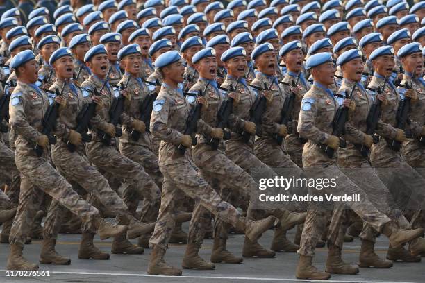 Soldiers of the People's Liberation Army march during a parade to celebrate the 70th Anniversary of the founding of the People's Republic of China in...