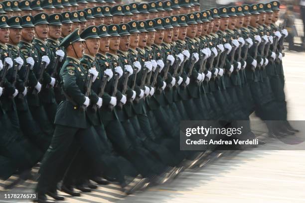 Soldiers of the People's Liberation Army march during a parade to celebrate the 70th Anniversary of the founding of the People's Republic of China in...