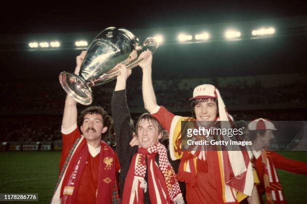 Liverpool's Scotland players from left to right, Graeme Souness, Kenny Dalglish and Alan Hansen celebrate with the Euopean Cup after their 1-0...