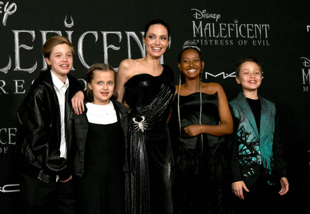 Shiloh Nouvel Jolie-Pitt, Vivienne Marcheline Jolie-Pitt, Angelina Jolie, Zahara Narley Jolie-Pitt and Knox Leon Jolie-Pitt arrive at the premiere of...