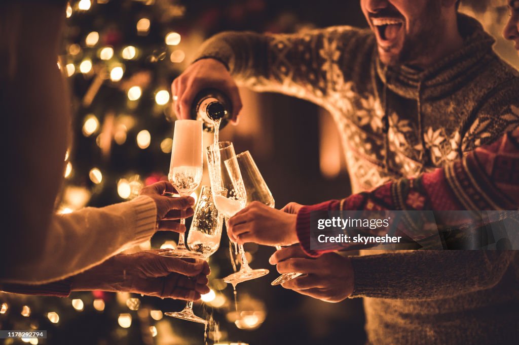 Pouring champagne on New Year's party!