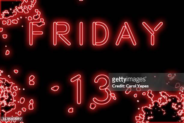 friday  13 in neon light - friday the 13th stock pictures, royalty-free photos & images