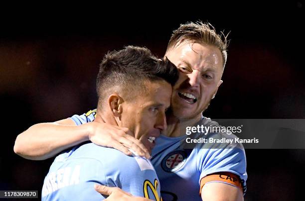 Marcelo Cabrera Rivero of Melbourne is congratulated by team mates after scoring a goal during the FFA Cup 2019 Semi Final between the Brisbane...