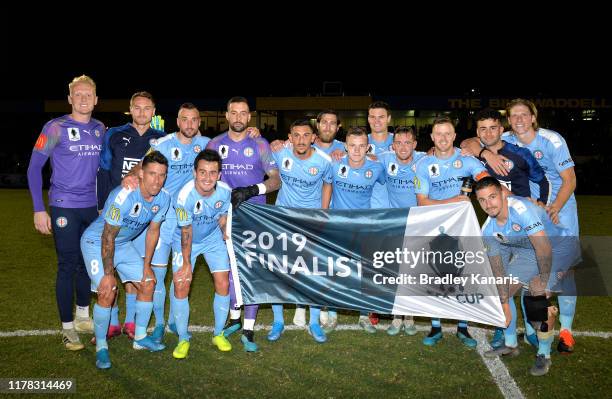 Melbourne City players celebrate victory after winning the FFA Cup 2019 Semi Final between the Brisbane Strikers and Melbourne City FC at Perry Park...