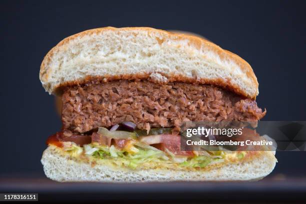 meat free plant based burger - veganism stock pictures, royalty-free photos & images