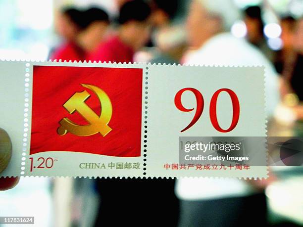 Memento China '1921-2011' stamp is seen on July 1, 2011 in Hangzhou, Zhejiang Province of China. People from all over China celebrate together for...