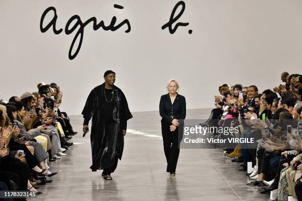Singer Oxmo Puccino and designer Agnes Trouble walk the runway during the Agnes B. Ready to Wear Spring/Summer 2020 fashion show as part of Paris...