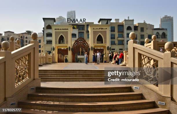 bridge to souk al bahar, dubai, united arab emirates - dubai fountain stock pictures, royalty-free photos & images