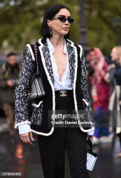 Brittany Xavier is seen wearing Chanel outside the Chanel show during Paris Fashion Week SS20 on October 1, 2019 in Paris, France.
