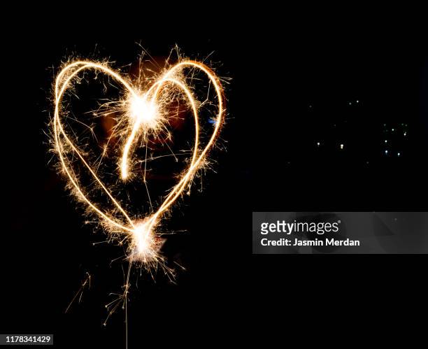 heart love sparkle - an evening with heart fotografías e imágenes de stock