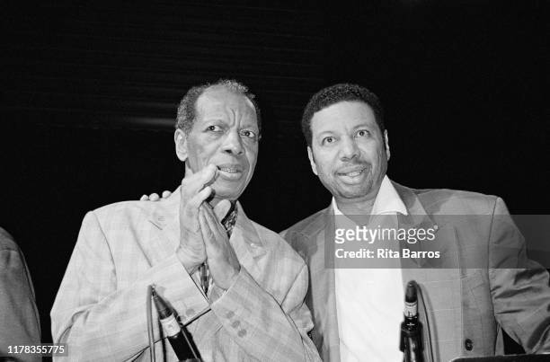 Portrait of American Jazz musician Ornette Coleman with his son, fellow musician Denardo Coleman, during the former's birthday celebration at Joe's...