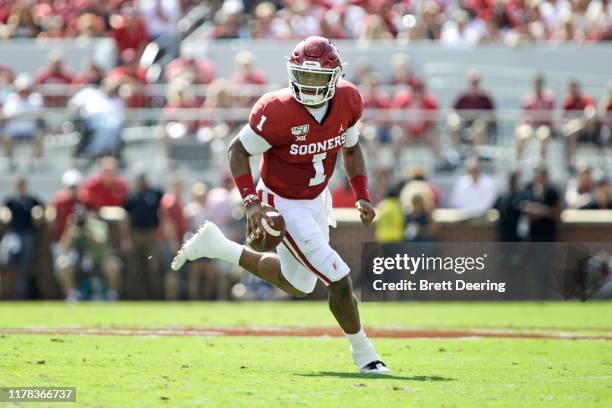 Quarterback Jalen Hurts of the Oklahoma Sooners scrambles against the Texas Tech Red Raiders at Gaylord Family Oklahoma Memorial Stadium on September...